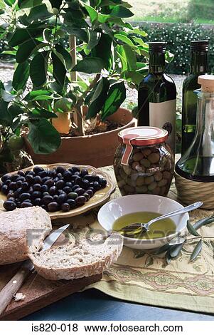 Olives olive oil and bread View Large Photo Image Stock Photo - Olives olive oil and bread. Fotosearch