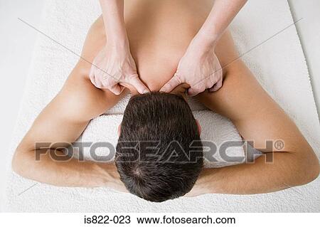 Man being massaged View Large Photo Image Stock Image - Man being massaged. Fotosearch