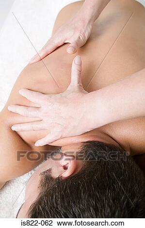 Man having a massage View Large Photo Image Stock Image - Man having a massage. Fotosearch