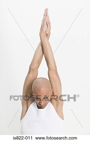 Stock Image - Man stretching. Fotosearch