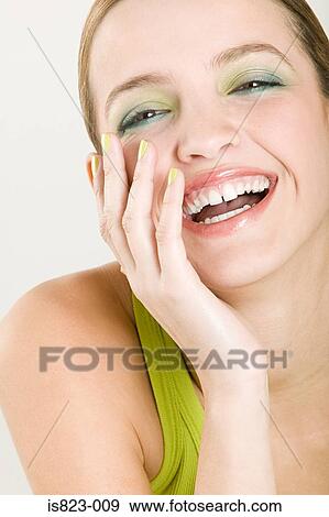 Stock Photo - Beautiful woman laughing. Fotosearch