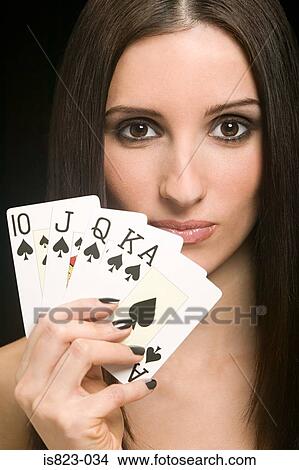 Woman holding playing cards View Large Photo Image Picture - Woman holding playing cards. Fotosearch