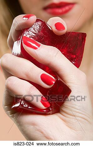Woman squahsing a bar of jelly View Large Photo Image Picture - Woman squahsing a bar of jelly. Fotosearch