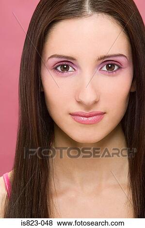 Woman wearing pink make-up View Large Photo Image Stock Photo - Woman wearing pink make-up. Fotosearch