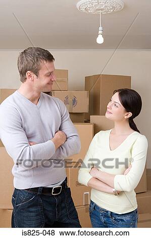 Stock Photo - Couple with cardboard boxes. Fotosearch