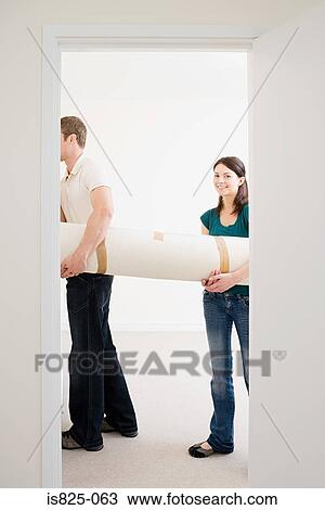 Couple with carpet View Large Photo Image Stock Image - Couple with carpet. Fotosearch