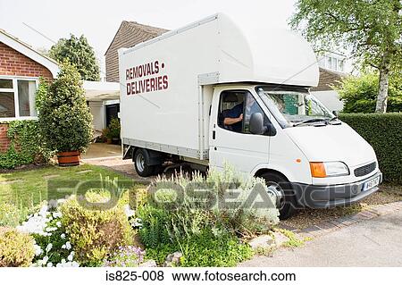 Stock Photo - Removal van in driveway. Fotosearch