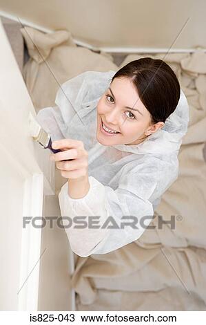 Woman painting View Large Photo Image Stock Image - Woman painting. Fotosearch