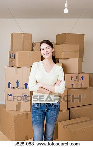 Woman with cardboard boxes View Large Photo Image Stock Image - Woman with cardboard boxes. Fotosearch