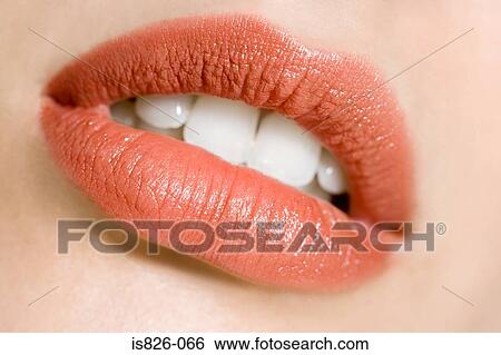 Stock Photograph - Wearing lipstick. Fotosearch