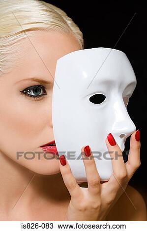 Woman holding mask View Large Photo Image Stock Image - Woman holding mask. Fotosearch
