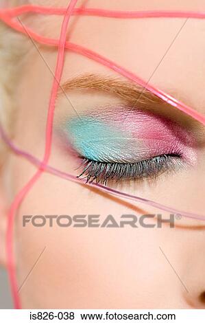 Woman with cables across her face View Large Photo Image Stock Photo - Woman with cables across her face. Fotosearch