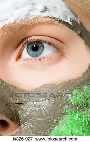Stock Photo - Woman with face masks on. Fotosearch