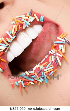 Woman with sugar sprinkles on her lips View Large Photo Image Stock Image - Woman with sugar sprinkles on her lips. Fotosearch