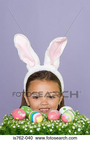 Girl wearing rabbit ears View Large Photo Image Stock Image - Girl wearing rabbit ears. Fotosearch