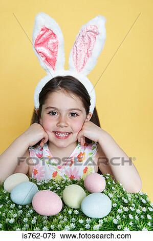 Girl wearing rabbit ears View Large Photo Image Stock Photo - Girl wearing rabbit ears. Fotosearch