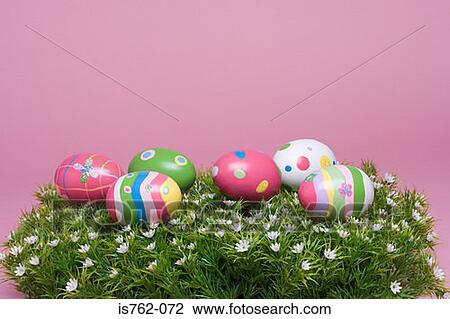 Painted easter eggs on grass View Large Photo Image Stock Image - Painted easter eggs on grass. Fotosearch