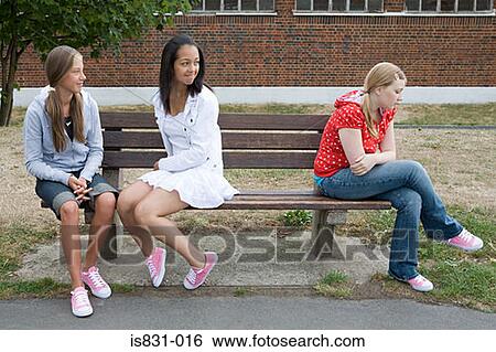 Stock Photograph - Girl being bullied. Fotosearch