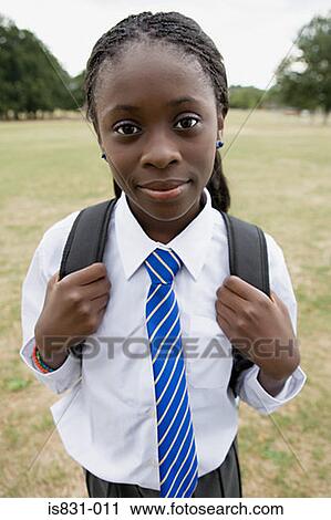 Girl in school uniform View Large Photo Image Stock Image - Girl in school uniform. Fotosearch