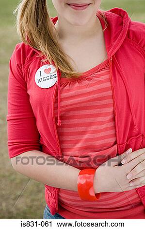 Girl wearing a badge View Large Photo Image Stock Image - Girl wearing a badge. Fotosearch