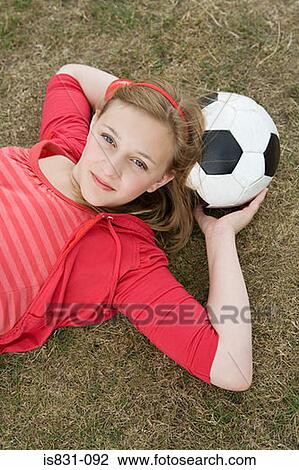 Girl with football View Large Photo Image Stock Image - Girl with football. Fotosearch