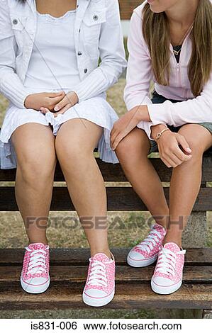 Girls in matching shoes View Large Photo Image Stock Photograph - Girls in matching shoes. Fotosearch
