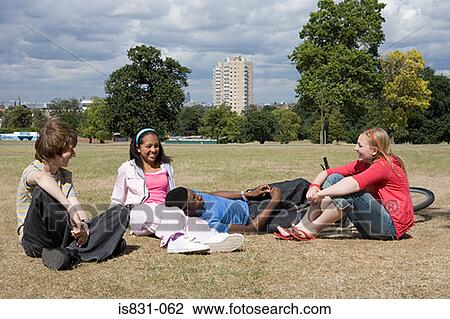 Stock Image - Teenagers in playing field. Fotosearch