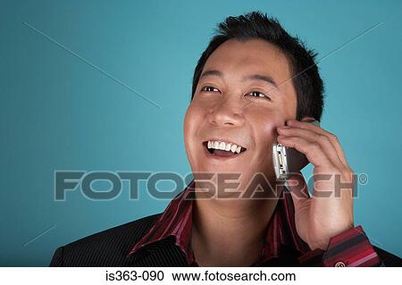 Stock Image - Man getting good news. Fotosearch
