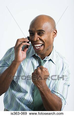Stock Photo - Man getting good news. Fotosearch