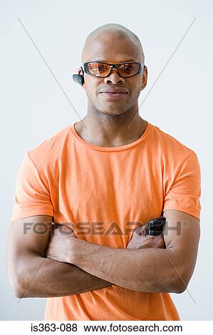 Man wearing headset and sunglasses View Large Photo Image Stock Photo - Man wearing headset and sunglasses. Fotosearch