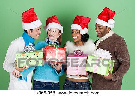 Group of friends with presents View Large Photo Image Stock Photo - Group of friends with presents. Fotosearch