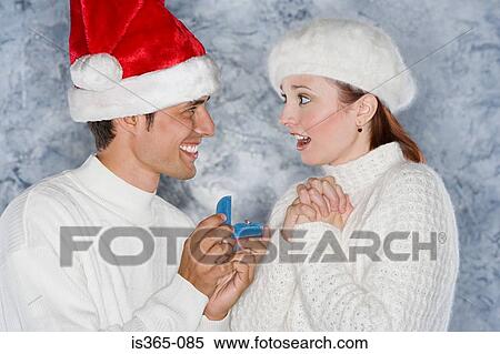 Man proposing to woman View Large Photo Image Stock Photography - Man proposing to woman. Fotosearch