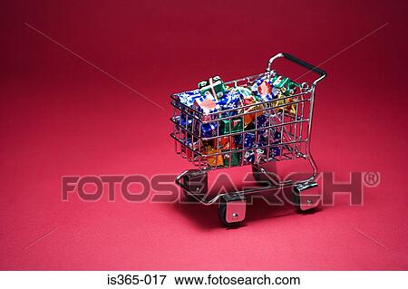 Shopping trolley full of presents View Large Photo Image Stock Photo - Shopping trolley full of presents. Fotosearch