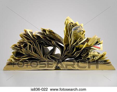Stock Image - Crumpled pages of telephone directory. Fotosearch
