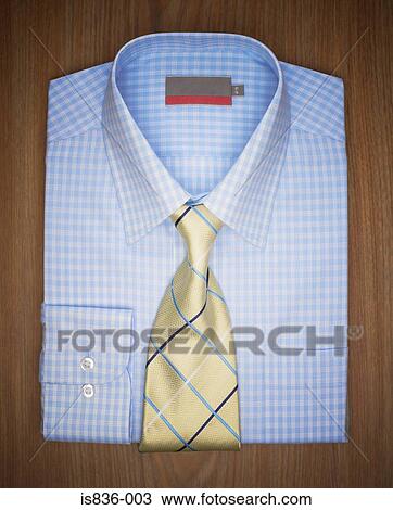 Folded shirt and tie View Large Photo Image Stock Image - Folded shirt and tie. Fotosearch