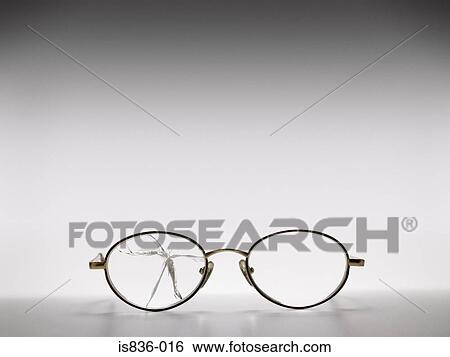Glasses with a broken lens View Large Photo Image Stock Photograph - Glasses with a broken lens. Fotosearch