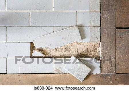 Picture - Broken floor tiles. Fotosearch