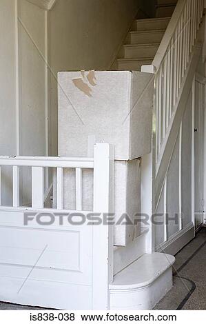 Cardboard boxes on staircase View Large Photo Image Stock Photo - Cardboard boxes on staircase. Fotosearch