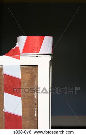 Cordon tape on piece of furniture View Large Photo Image Stock Photograph - Cordon tape on piece of furniture. Fotosearch