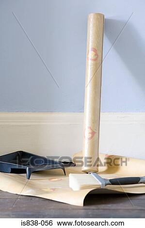 Rolls of wallpaper and brush View Large Photo Image Stock Photograph - Rolls of wallpaper and brush. Fotosearch