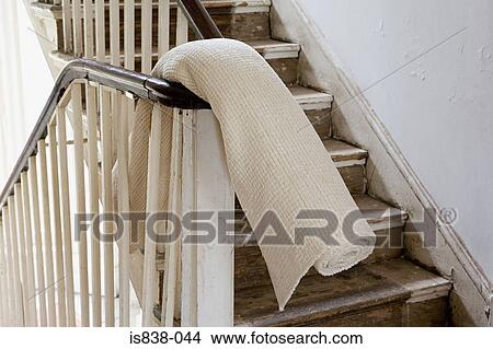 Rug on a banister View Large Photo Image Picture - Rug on a banister. Fotosearch