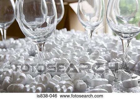 Stock Photograph - Wine glasses in packing peanuts. Fotosearch