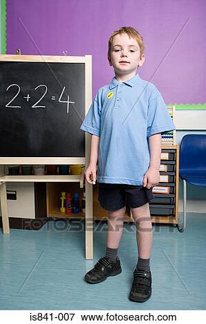 Boy solving sums View Large Photo Image Stock Photo - Boy solving sums. Fotosearch