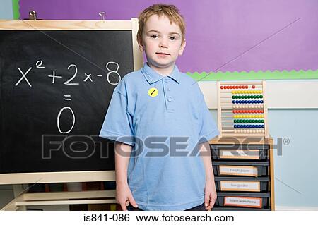 Boy solving sums View Large Photo Image Stock Photograph - Boy solving sums. Fotosearch
