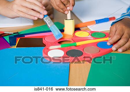Stock Photograph - Children painting. Fotosearch