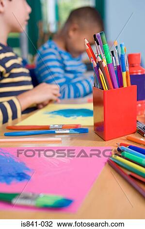 Coloured pencils and paintbrushes View Large Photo Image Stock Image - Coloured pencils and paintbrushes. Fotosearch