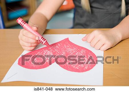 Drawing a heart shape View Large Photo Image Stock Photo - Drawing a heart shape. Fotosearch