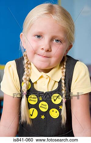 Stock Image - Girl wearing stickers. Fotosearch