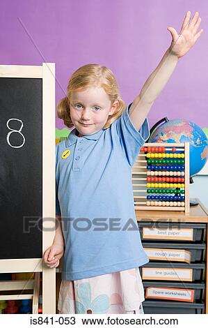 Girl with arm raised View Large Photo Image Stock Image - Girl with arm raised. Fotosearch
