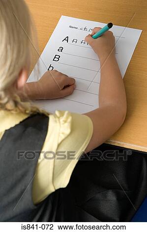 Girl writing alphabet View Large Photo Image Stock Image - Girl writing alphabet. Fotosearch